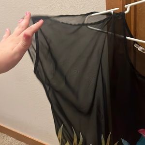 Maurice’s size 2 see trough shirt